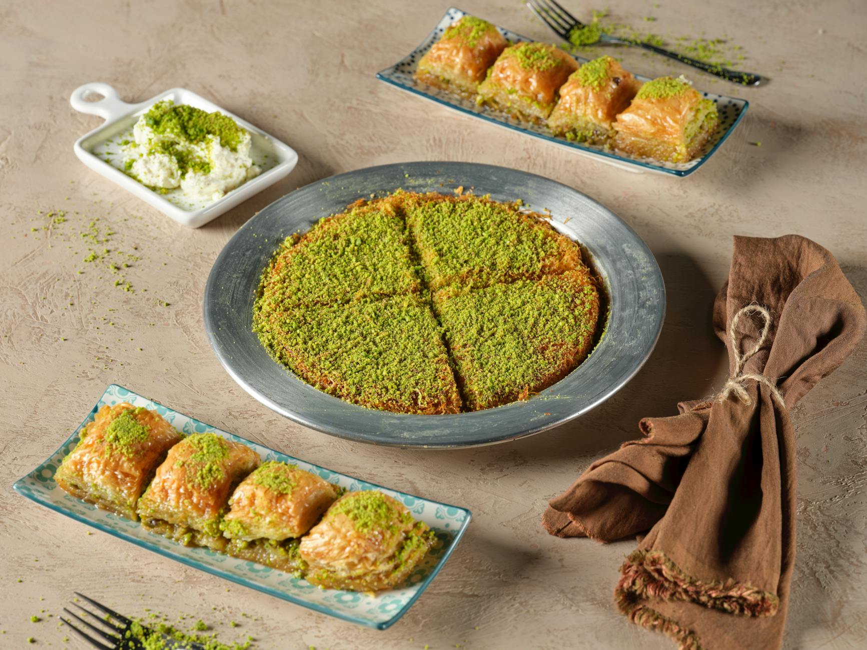 Cairo Egyptian Food Guide — Must-Try Dishes, Restaurants, and Street Food 8 Egyptian kunafa and Om Ali desserts served at a traditional Cairo bakery