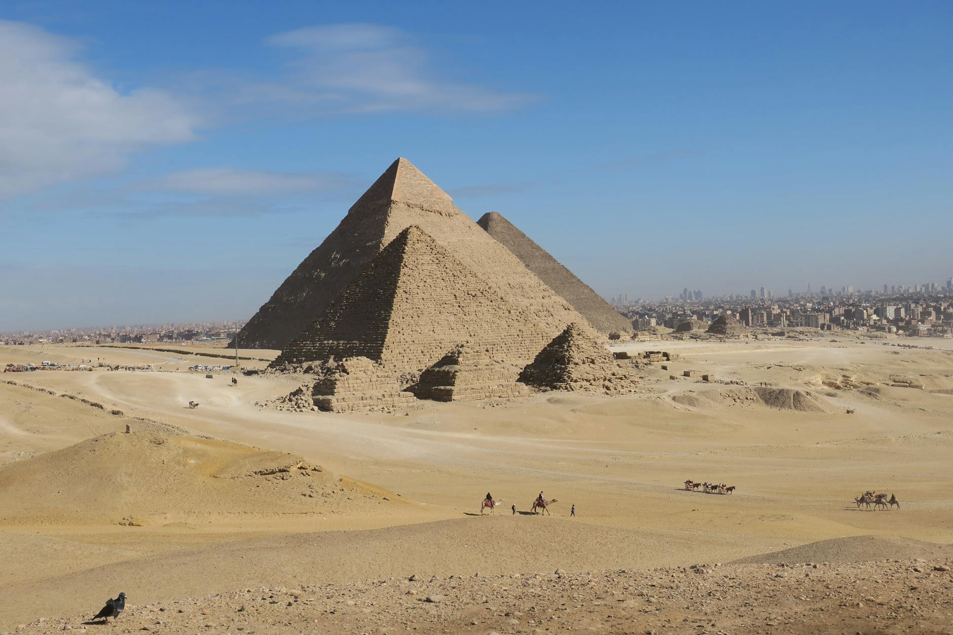 Pyramids of Giza Complete Visitor Guide — History, Tickets, and Tips 11 View of Cairo city skyline with the Pyramids of Giza visible in the distance