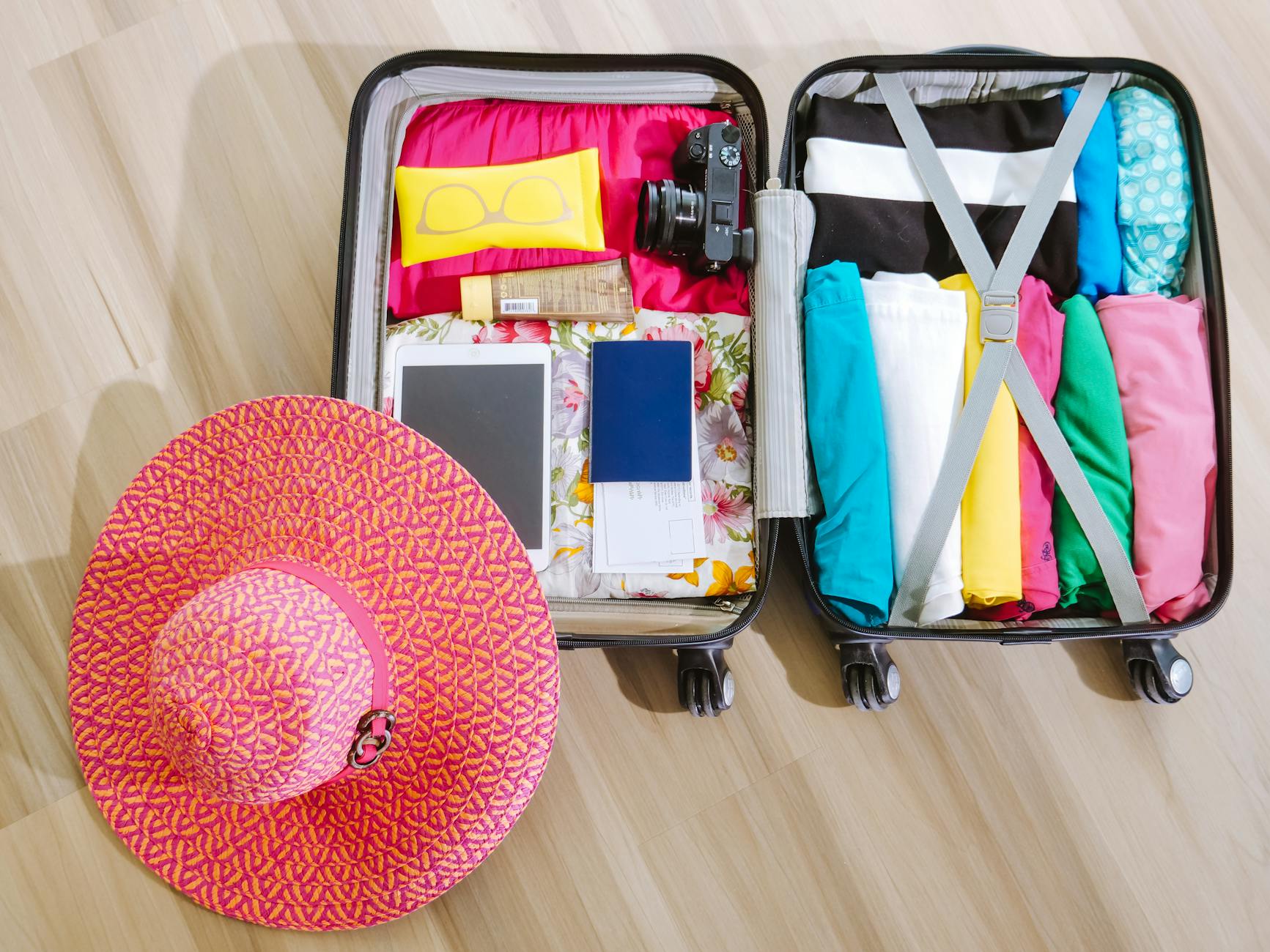 Cairo Travel Checklist: What to Prepare Before You Go 4 Cairo travel checklist packed suitcase with clothes camera sun hat