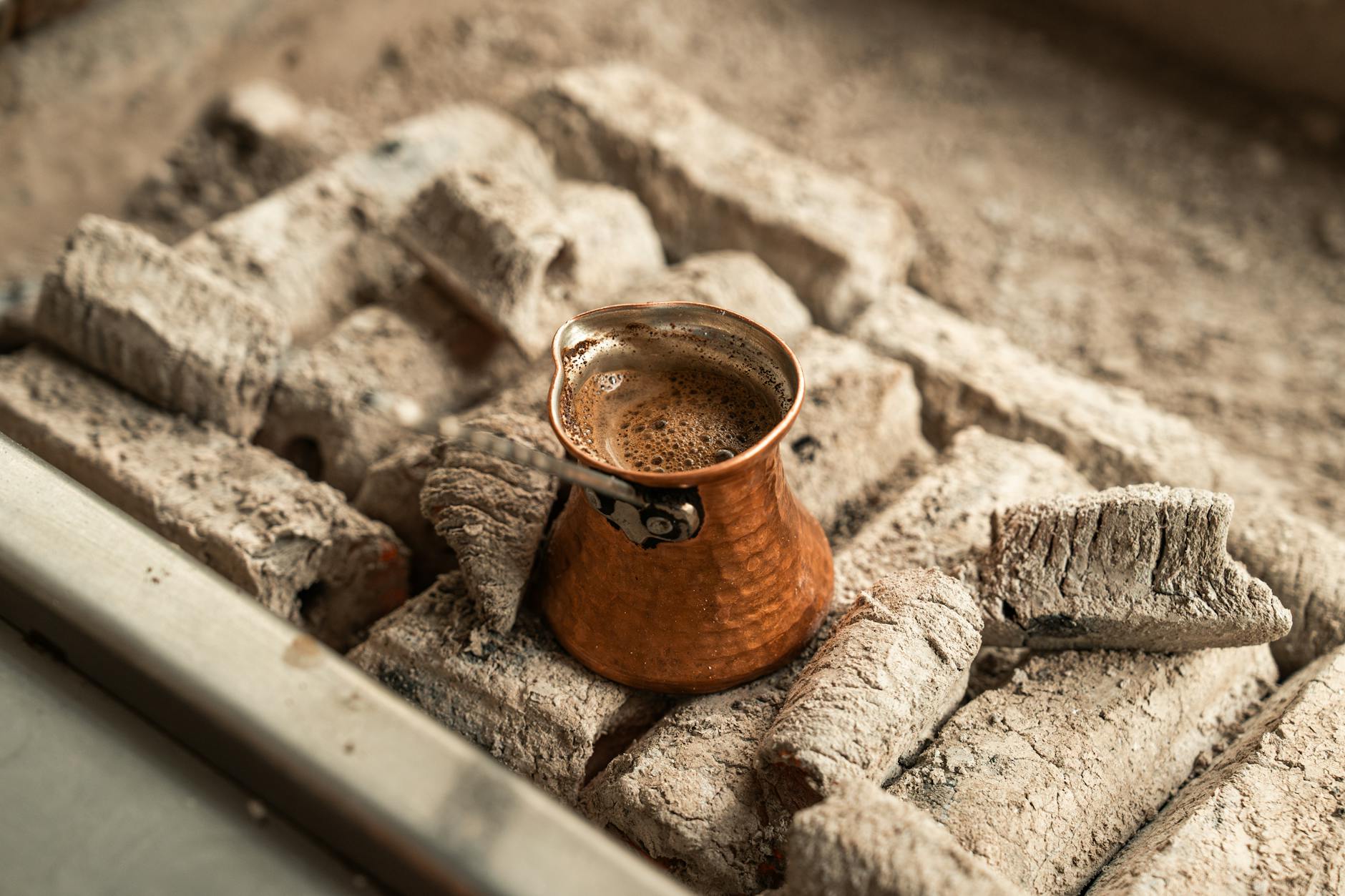 Cairo Egyptian Food Guide — Must-Try Dishes, Restaurants, and Street Food 9 Traditional Egyptian ahwa coffee prepared in a copper kanaka pot