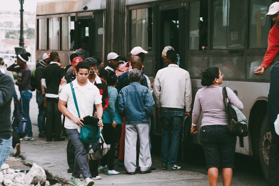 Cairo Bus System Guide: Public Bus Travel 3 Passengers waiting at bus stop