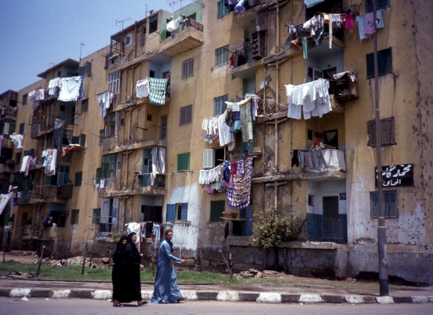 Pedestrians walking Cairo street