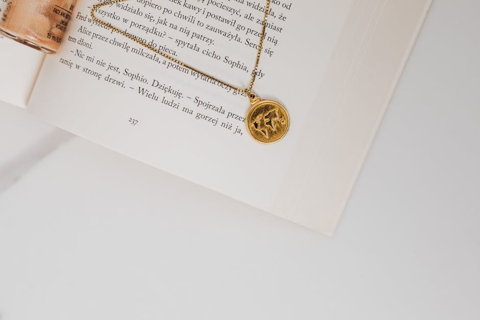 Gold pendant with hieroglyphs