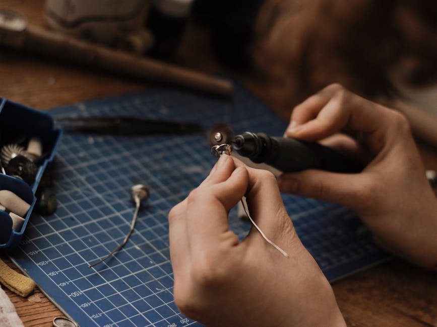 Jeweler crafting gold piece