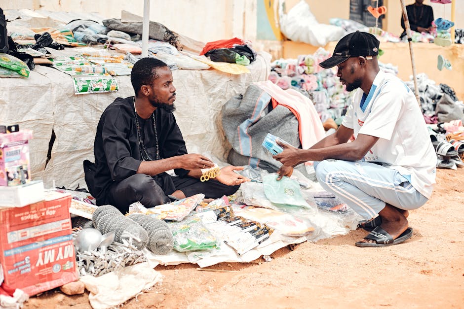 Vendor and customer discussing price at market