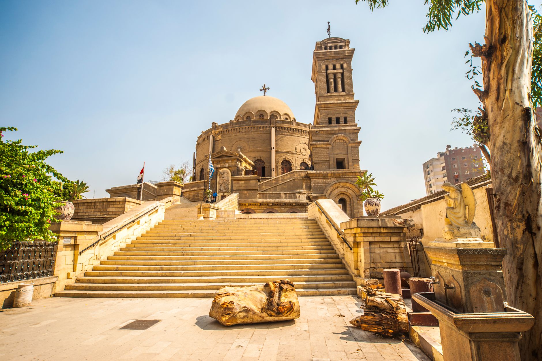 A narrow stone lane in Coptic Cairo lined with ancient churches and worn paving, Old Cairo Egypt