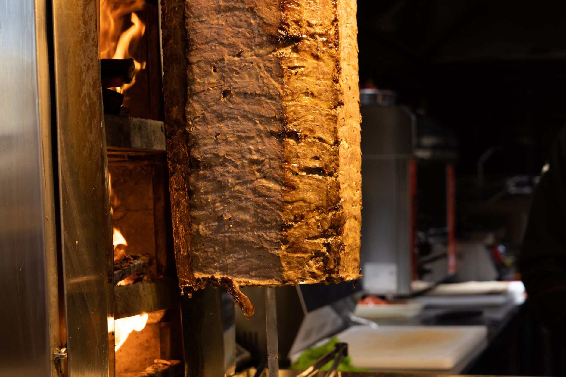 Best Street Food in Cairo: Local Flavors Guide 4 Cairo street grill cooking hawawshi and shawarma meat for sandwiches