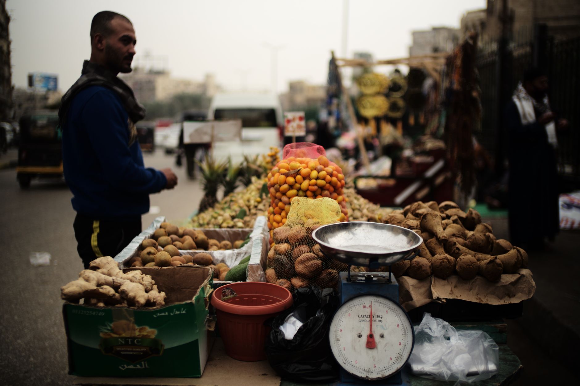 Best Street Food in Cairo: Local Flavors Guide 3 Cairo street vendor serving ful medames and taameya falafel for breakfast with baladi bread