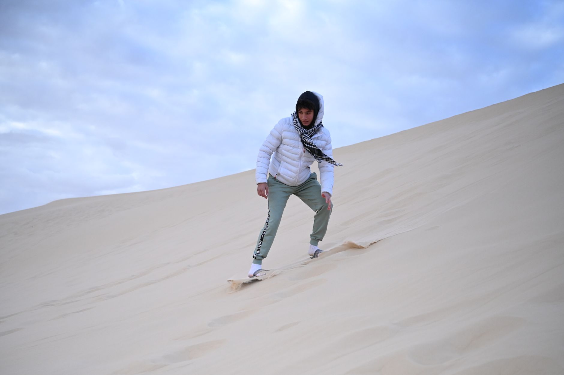 Cairo Adventure Activities: Thrills & Experiences 4 Golden desert dunes in Fayoum near Cairo, a spot for sandboarding, Egypt
