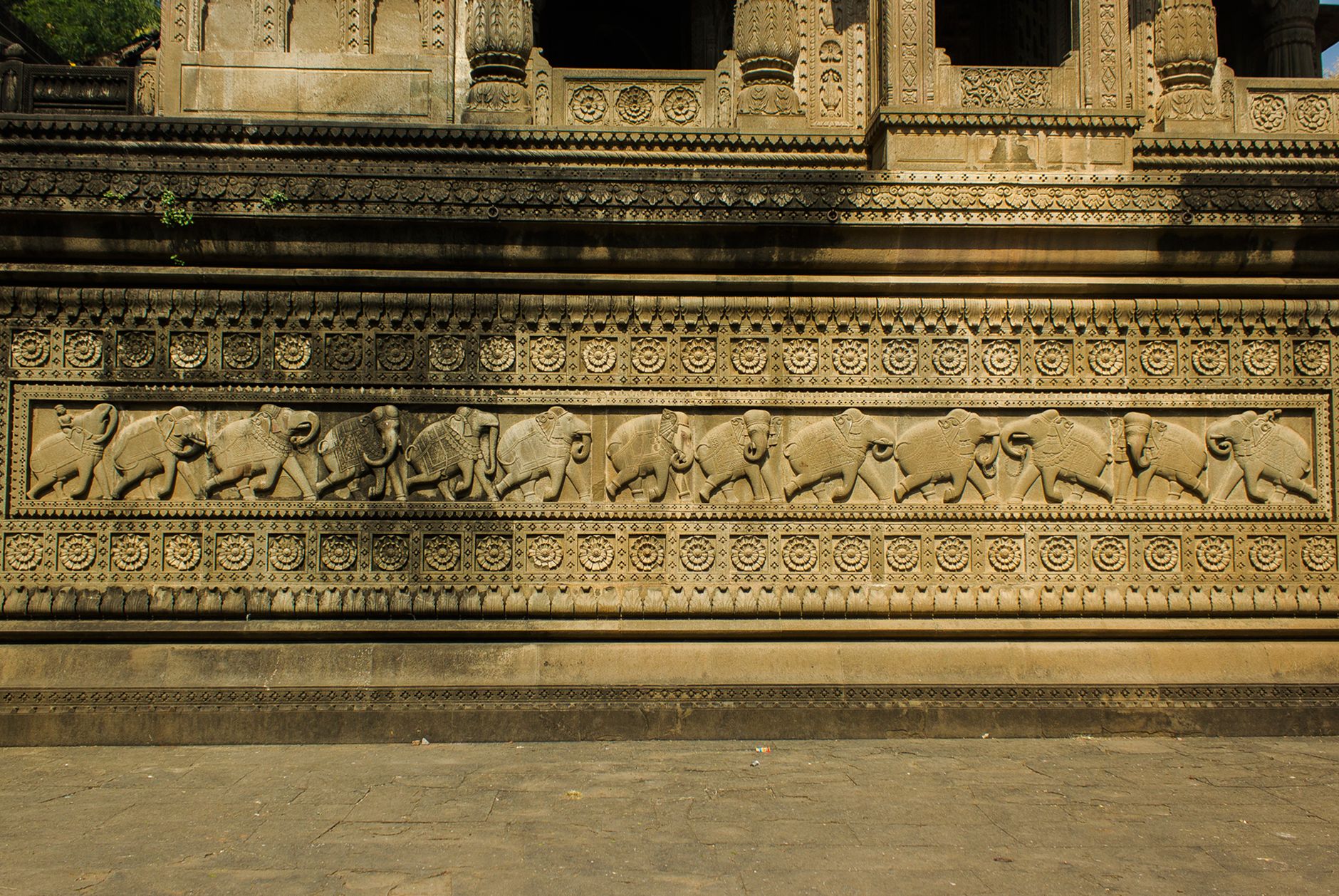 Baron Empain Palace Heliopolis: Abandoned Mansion 3 Ornate Hindu-style sandstone carvings of figures and snakes on Baron Empain Palace, Heliopolis Cairo