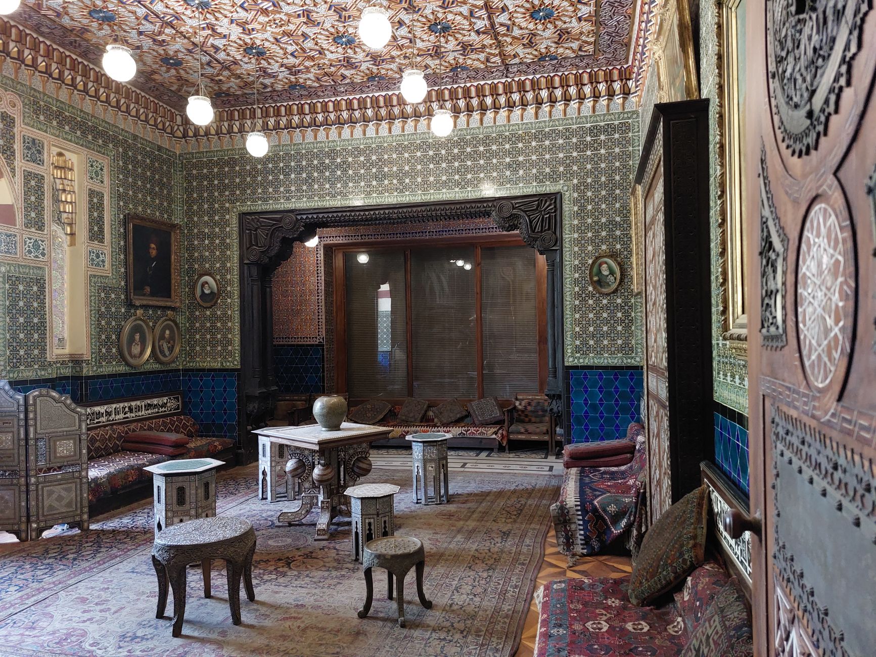 Stylish boutique design hotel room in Cairo, Egypt with vintage furniture and warm lighting