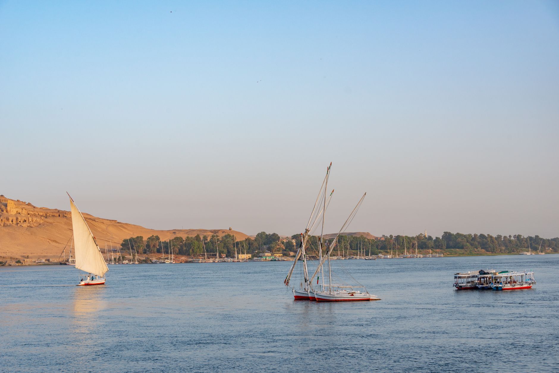 Cairo Nile River Experiences: Complete Guide to the Nile 6 Traditional two-masted dahabiya sailing boat on the calm Nile in Upper Egypt