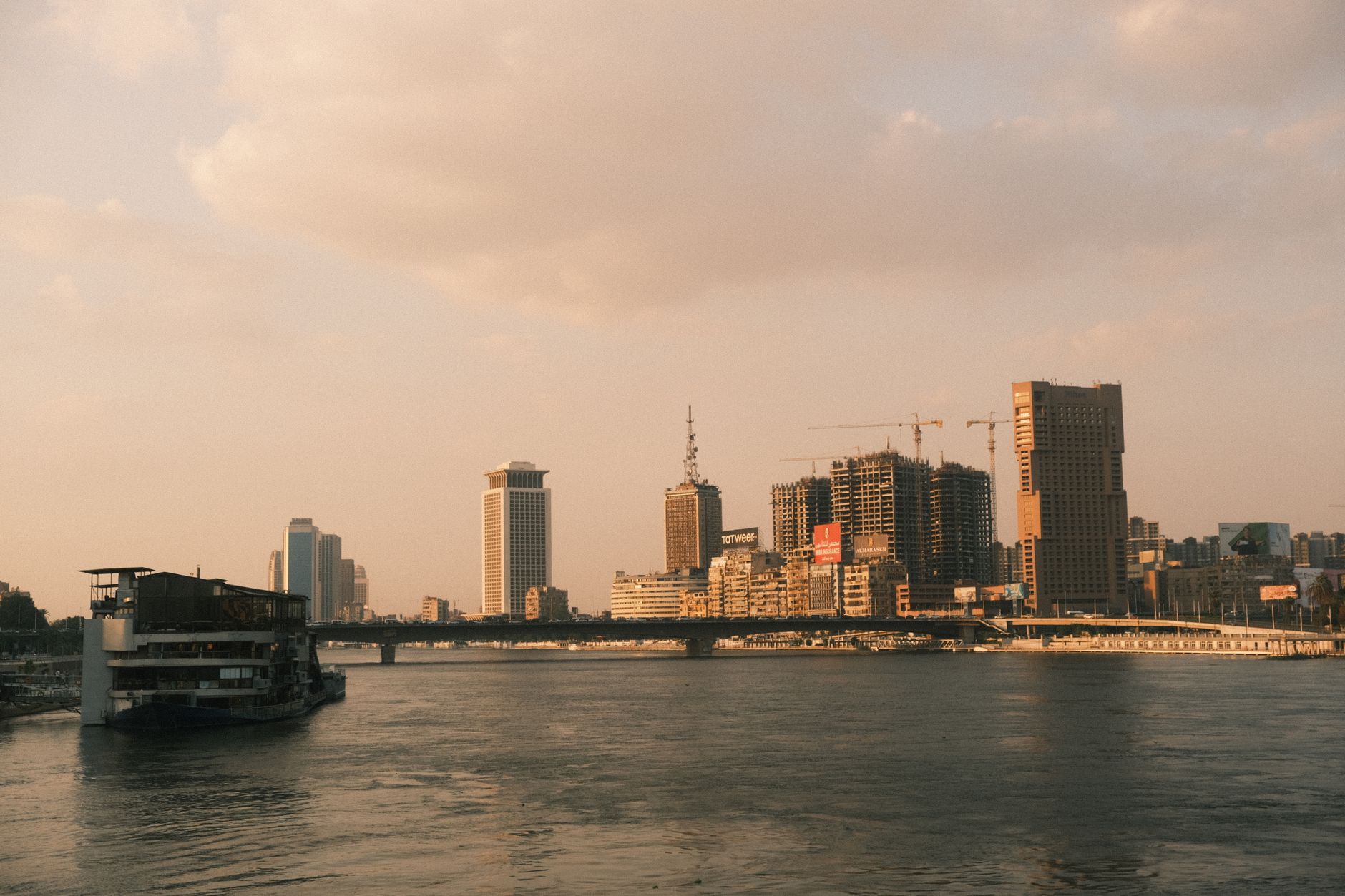 Nile Dinner Cruise Cairo Guide: Evening Dining 5 Cairo skyline lights reflected on the Nile at night