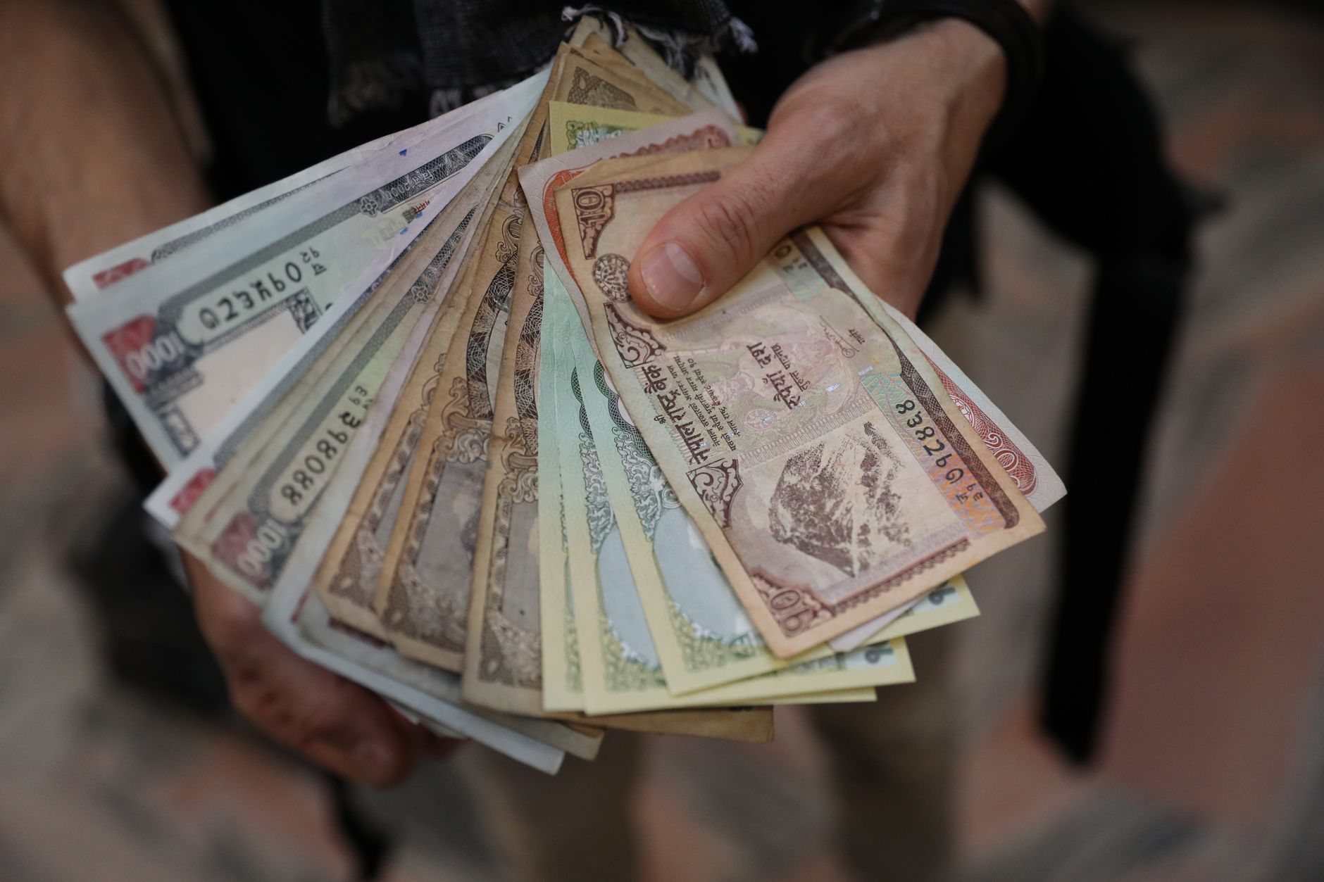 Egyptian pound banknotes small denominations in hand