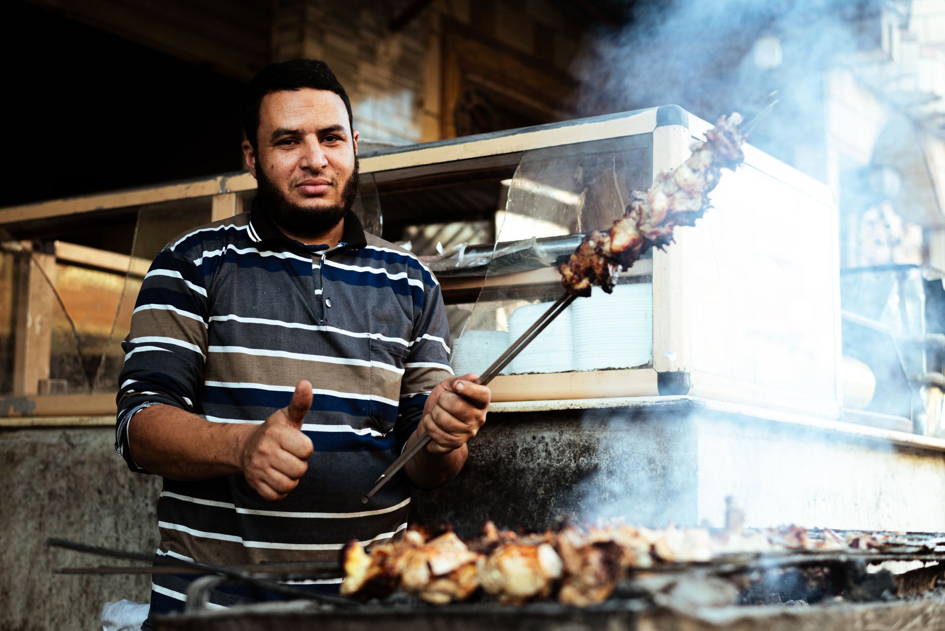 Cheap Eats in Cairo: Budget Food Guide 3 Egyptian ta'ameya frying at a street stall