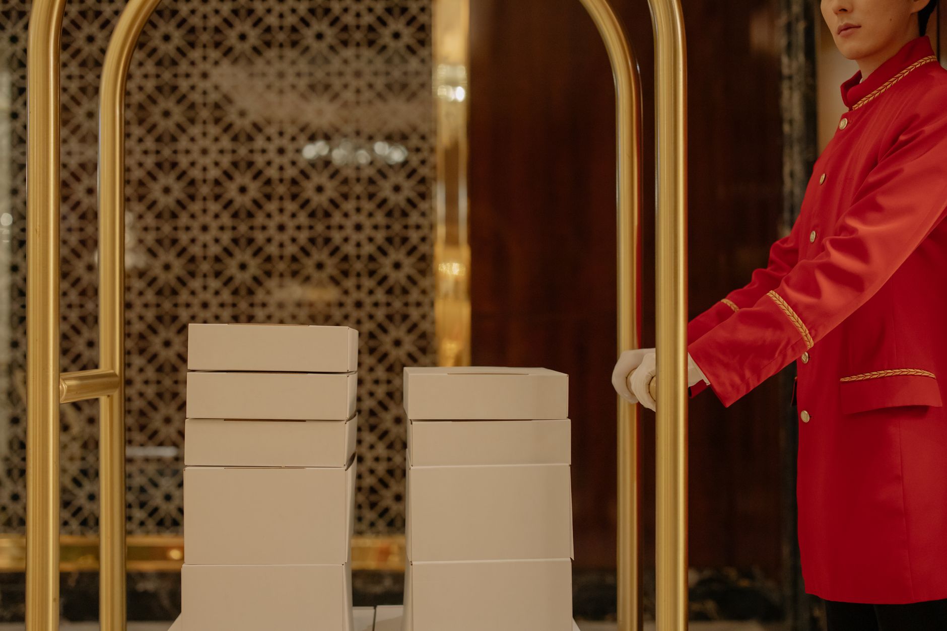 Hand passing small banknote to hotel porter