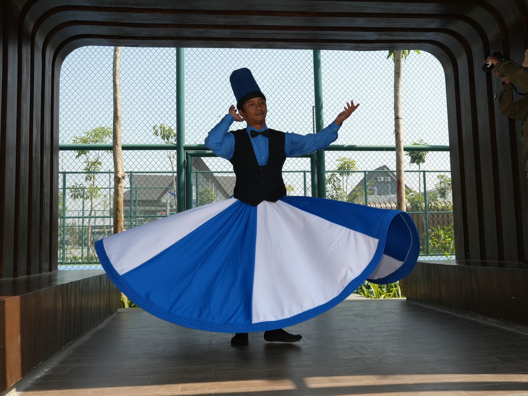 Nile Dinner Cruise Cairo Guide: Evening Dining 3 Tanoura sufi whirling dancer performing in a lit skirt