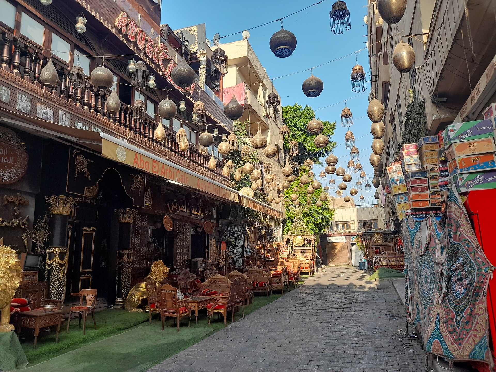 Cairo Itineraries: Day-by-Day Plans for 1 to 7 Days 2 Lantern-hung alley off Al-Muizz Street in Islamic Cairo with a traditional café and brass shops