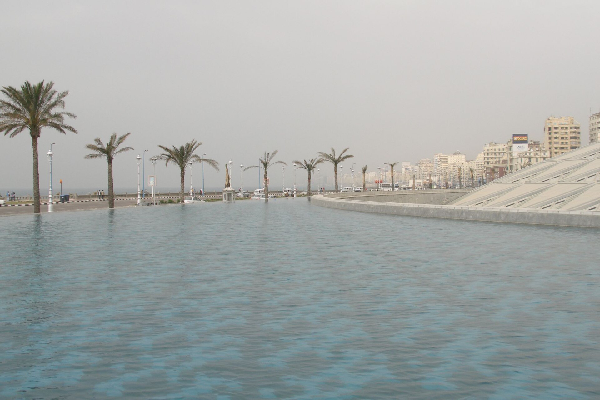 Five Days in Cairo: Beyond the Highlights 4 The tilted disc roof of the Bibliotheca Alexandrina beside its reflecting pool and the Alexandria corniche