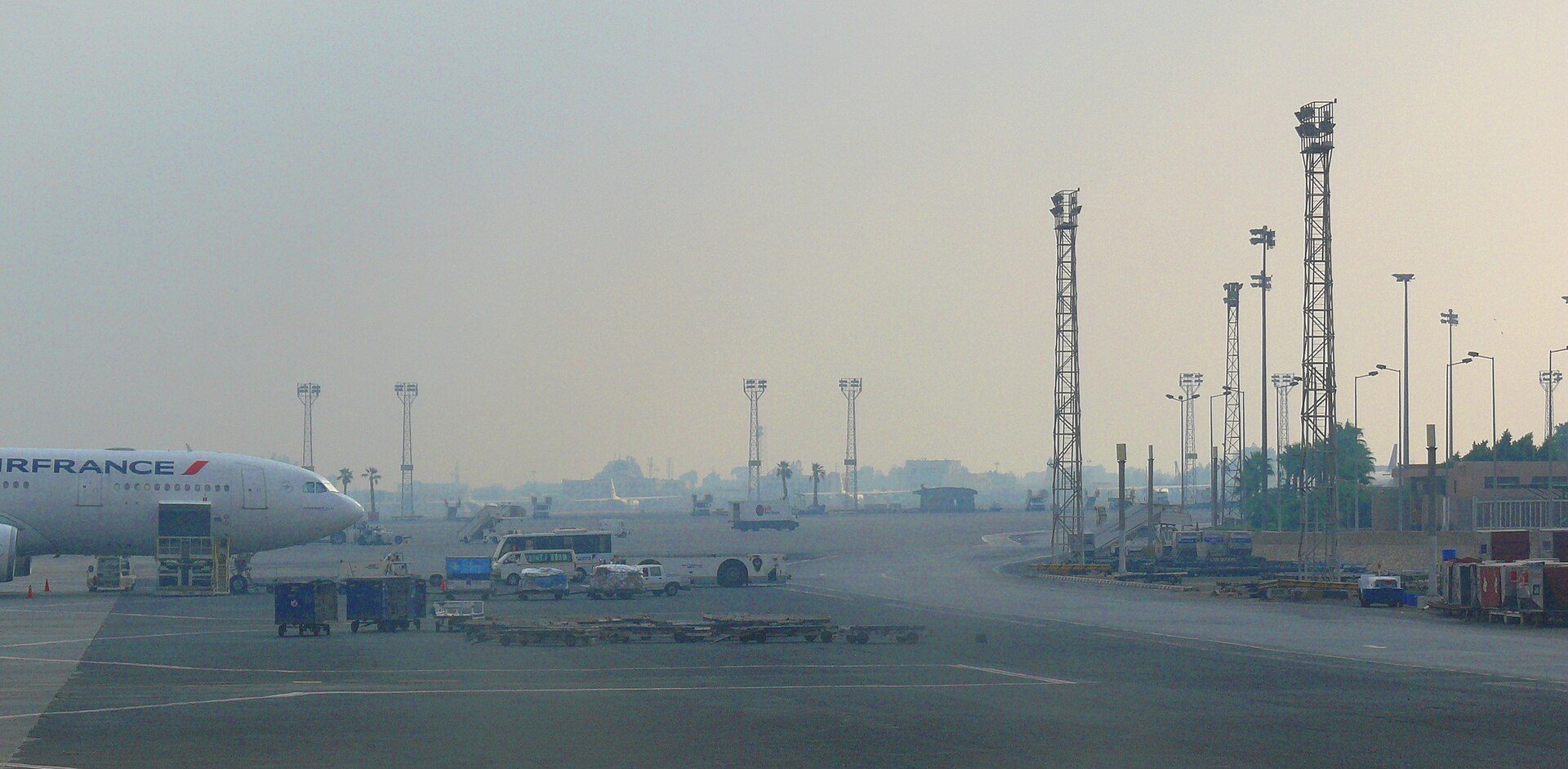 Cairo Airport Lounges: Access, Priority Pass and Reviews 5 An Air France airliner and ground-service vehicles on the apron at Cairo International Airport on a hazy morning