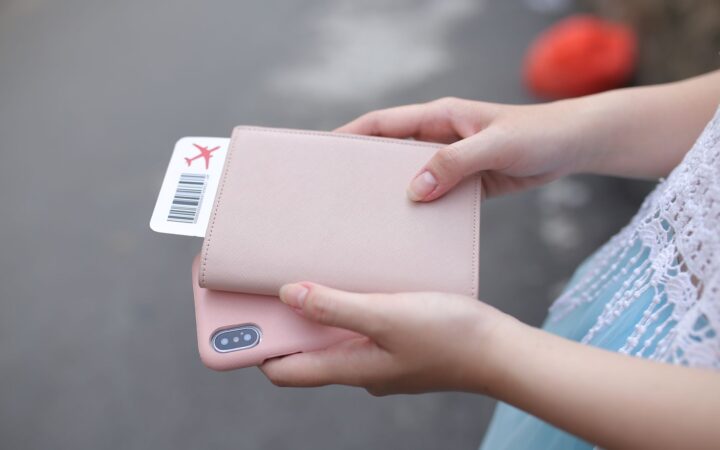 passport boarding pass and phone
